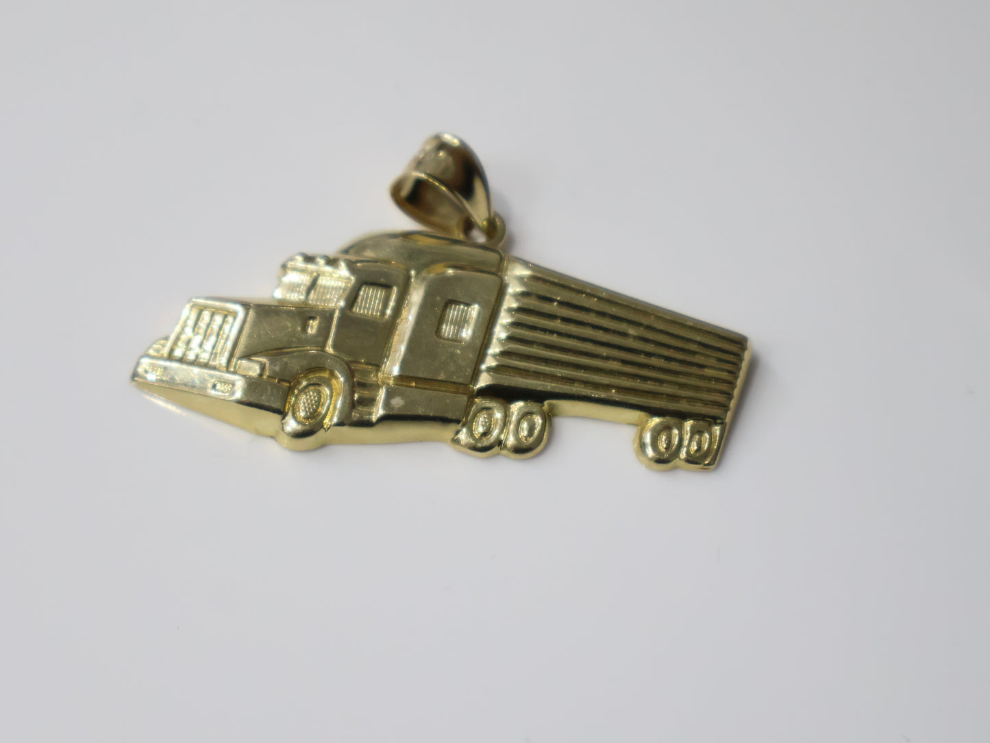 10K Gold Approx 2Inch Truck Pendant Approx 7.9Grams