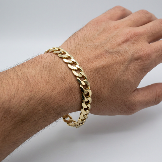 Original gold curb-link bracelet on a male wrist